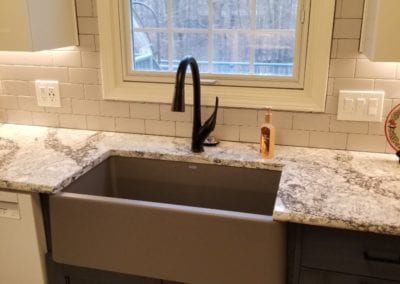 Bessick - apron front sink finish